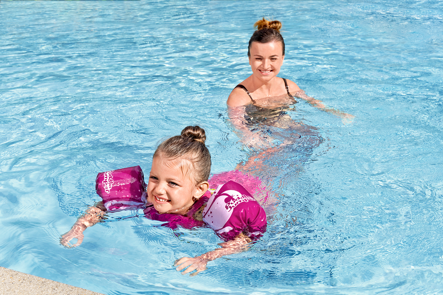 Puddle Jumper® Schwimmflügelweste Blume mit Textilbezug, 2-6 Jahre Puddle Jumper® Schwimmflügelweste Blume mit Textilbezug, 2-6 Jahre