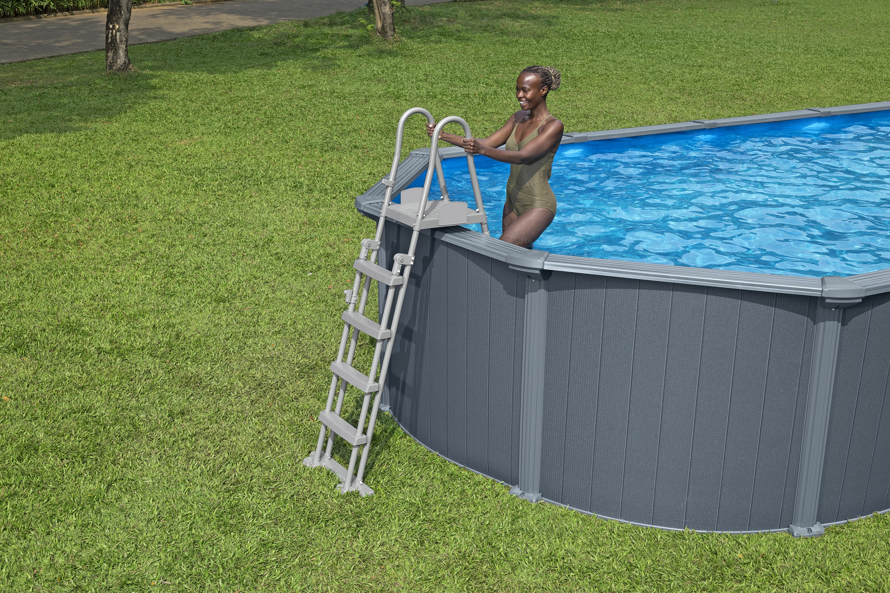 Hydrium™ Stahlwandpool Komplett Set mit Sandfilteranlage 732 x 366 x 132 cm, Holz Optik (Grau), oval